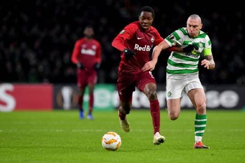 SOCCER - UEFA EL, Celtic vs RBS GLASGOW,SCOTLAND,13.DEC.18 - SOCCER - UEFA Europa League, group stage, Celtic Glasgow vs Red Bull Salzburg. Image shows Enock Mwepu (RBS) and Scott Brown (Celtic). GEPAxpictures xFlorianxErtl