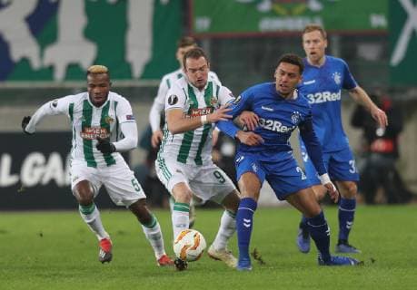 SOCCER - UEFA EL, Rapid vs Rangers VIENNA,AUSTRIA,13.DEC.18 - SOCCER - UEFA Europa League, group stage, SK Rapid Wien vs Glasgow Rangers. Image shows Boli Bolingoli (Rapid), Veton Berisha (Rapid) and James Tavernier (Rangers). Keywords: Wien Energie. GEPAxpictures xChristianxOrt