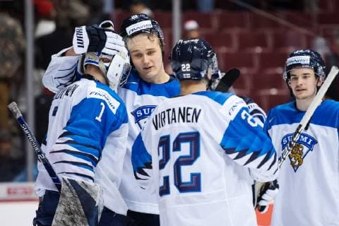 181223 Goaltender Ukko-Pekka Luukkonen and Otto Latvala of Finland celebrate their teams win during the U20 Ice hockey Eishockey game between Finland and Canada on December 23, 2018 in Vancouver. Photo: Joel Marklund BILDBYRN kod JM 87821 Copyright: JOELxMARKLUND BB181223JM025