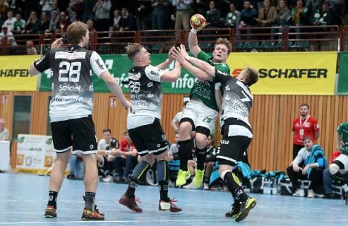 v.li.: Malte Seidel (TuSEM Essen), Tim Zechel (TuSEM Essen), Lukas Siegler (DJK Rimpar Wölfe), Luca Witzke (TuSEM Essen), DKB 2. Handball-Bundesliga, DJK Rimpar Wölfe - TuSEM Essen,
