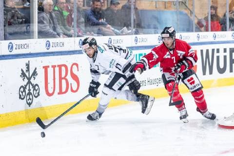 28.12.2018 - Eishockey - Saison 2018 2019 - Spengler Cup - Spiel 2: Team Canada - Thomas Sabo Ice Tigers Icetigers Nürnberg - ThHa - Tim Bender (77, Thomas Sabo Ice Tigers ) Colt Conrad (7, Team Canada )