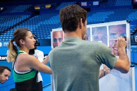 Belinda Bencic und Roger Federer, Mixed Doubles setzen ein Spieler Portrait Puzzle zusammen. Copyright: xJuergenxHasenkopfx