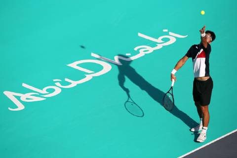 (181229) -- ABU DHABI, Dec. 29, 2018 (Xinhua) -- Hyeon Chung of South Korea serves during the match against Dominic Thiem of Austria at the 2018 Mubadala World Tennis Championship in Abu Dhabi, the United Arab Emirates (UAE), on Dec. 28, 2018. Hyeon Chung won 2-0. (Xinhua Mahmoud Khaled) (SP)UAE-ABU DHABI-TENNIS-MUBADALA WORLD TENNIS CHAMPIONSHIP 