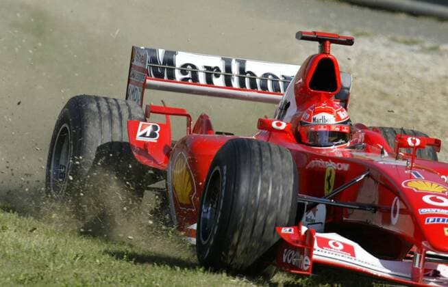 Germany s Formula One driver Michael Schumacher leaves the A1 race track during the free practice of the Austrian Formula One GP in Spielberg, Austria, Saturday, May 17, 2003. ( Eckehard Schulz) SPIELBERG AUT