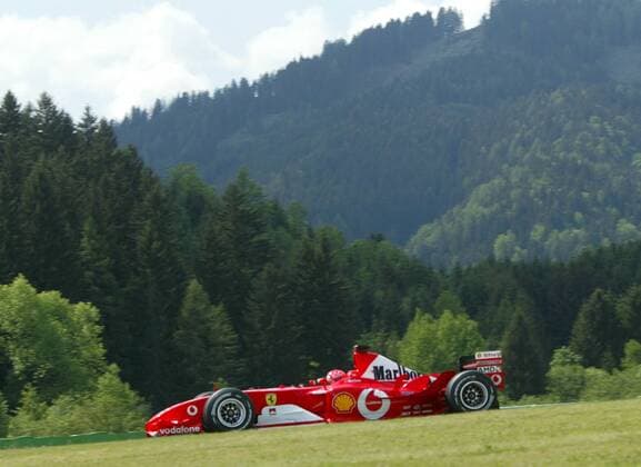 Germany s Formula One driver Michael Schumacher steers his Ferrari at the A1 race track during the second qualifying of the Austrian Formula One GP in Spielberg, Austria, Saturday, May 17, 2003. He will starts from pole position in the race on Sunday, May 18, 2003. ( Eckehard Schulz) SPIELBERG AUT