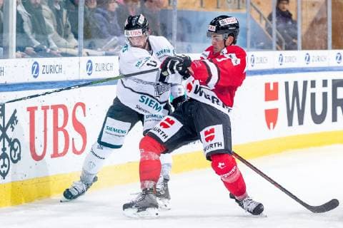 30.12.2018 - Eishockey - Saison 2018 2019 - Spengler Cup - Halbfinale: Team Canada - Thomas Sabo Ice Tigers Icetigers Nürnberg - ThHa - Dante Fabbro (8, Team Canada ) Chris Brown (11, Thomas Sabo Ice Tigers )
