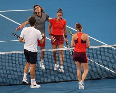 Roger Federer und Belinda Bencic gratulieren Maria Sakkari und Stefanos Tsitsipas zu ihrem Sieg,Jubel,Freude,Emotion ,Mixed Doubles Copyright: xJuergenxHasenkopfx