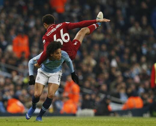 Sport Themen der Woche KW01 Sport Bilder des Tages Leroy Sane of Manchester City clashes with Trent Alexander-Arnold of Liverpool during the Premier League match at the Etihad Stadium, Manchester. Picture date: 3rd January 2019. Picture credit should read: Andrew Yates Sportimage EDITORIAL USE ONLY. No use with unauthorised audio, video, data, fixture lists, club league logos or live services. Online in-match use limited to 120 images, no video emulation. No use in betting, games or single club league player publications. _AY21366.JPG