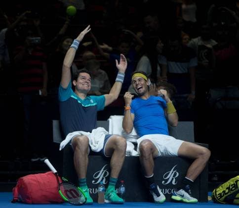 Sport Bilder des Tages (190107) -- SYDNEY, Jan. 7, 2019 (Xinhua) -- Rafael Nadal (R) of Spain and Milos Raonic of Canada react during the men s double match against Nick Kyrgios and John Millman of Australia at Fast4 Showdown in 2019 Sydney Tennis Open in Sydney, Australia, Jan. 7, 2019. Rafael Nadal and Milos Raonic won 2-1. (Xinhua Zhu Hongye) (SP)AUSTRALIA-SYDNEY-TENNIS-SYDNEY OPEN-FAST4 