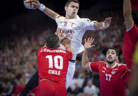 Rasmus Lauge of Denmark and Julio Baumann of Chile during the men s IHF Handball World Championship WM Weltmeisterschaft match in Group C between Denmark-Chile in Copenhagen , Denmark, on Thursday, Jan. 10, 2019.. , Copenhagen Denmark Copyright: Scanpix LiselottexSabroex COP101 spdk20190110-224349-L