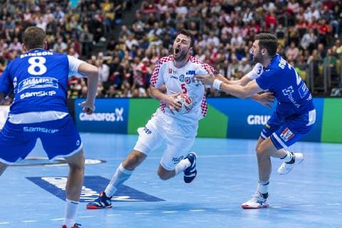 Muenchen, Deutschland 11. Januar 2019: WM 2019 Männer - Gruppe B - Island vs. Kroatien v.li. Bjarki Elisson (Island), Domagoj Duvnjak (Kroatien THW Kiel), Olafur Gustafsson (Island) Muenchen Olympiahalle Bayern Deutschland