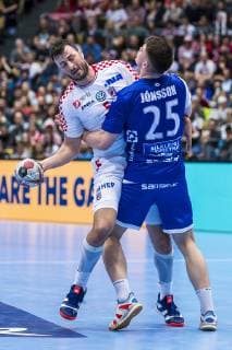 Muenchen, Deutschland 11. Januar 2019: WM 2019 Männer - Gruppe B - Island vs. Kroatien v.li. Domagoj Duvnjak (Kroatien THW Kiel), Elvar Orn Jonsson (Island) Muenchen Olympiahalle Bayern Deutschland
