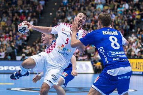 Muenchen, Deutschland 11. Januar 2019: WM 2019 Männer - Gruppe B - Island vs. Kroatien v.li. Domagoj Duvnjak (Kroatien THW Kiel), Bjarki Elisson (Island) Muenchen Olympiahalle Bayern Deutschland