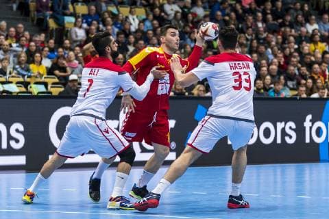 Muenchen, Deutschland 13. Januar 2019: WM 2019 Männer - Gruppe B - Mazedonien vs. Bahrain v.li. Ali Merza (Bahrain), Filip Churlevski (Mazedonien), Hasan Madan (Bahrain) Muenchen Olympiahalle Bayern Deutschland