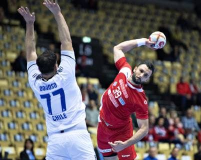 Mohamed Soussi of Tunisia against Victor Donoso of Chile during the men s IHF Handball World Championship WM Weltmeisterschaft Group C match between Tunisia and Chile in Herning, Denmark, on Monday, Jan 14, 2019.. , Herning Jylland Copyright: HenningxBagger HenningxBaggerx COP109 spdk20190114-154513-L