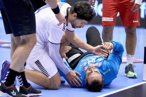 IHF Men s World Championship WM Weltmeisterschaft 2019 Group C handball match. Erwin Feuchtmann (4) of Chile by injured Marouen Maggaiz (12) of Tunisia during the men s IHF Handball World Championship Group C match 31 between Tunisia and Chile at the Jyske Bank Boxen arena in Herning Denmark on Monday January 14, 2019. Denmark 