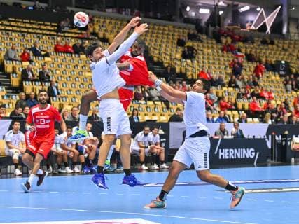HANDBALL - IHF WC, TUN vs CHI HERNING,DENMARK,14.JAN.19 - HANDBALL - IHF Men s World Championships, international match Länderspiel Tunisia vs Chile. Image shows Oussama Hosni (TUN), Erwin Feuchtmann (CHI), Mosbah Sanai (TUN) and Javier Frelijj (CHI). GEPAxpictures xOliverxLerch