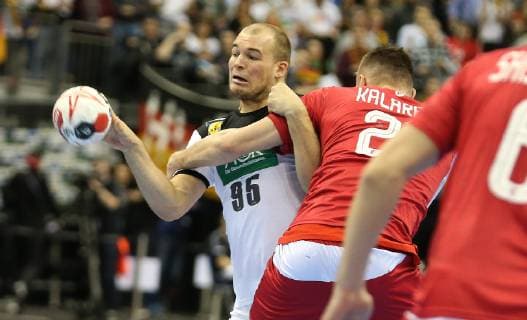 Paul Drux (Deutschland) wird gestoppt von Gleb Kalarash (Russland) beim Spiel Russland gegen Deutschland der Handball- WM 2019 der Maenner am 14.01.2019 in der Mercedes-Benz Arena in Berlin Handball - WM 2019 - Gruppe A - Deutschland - Russland