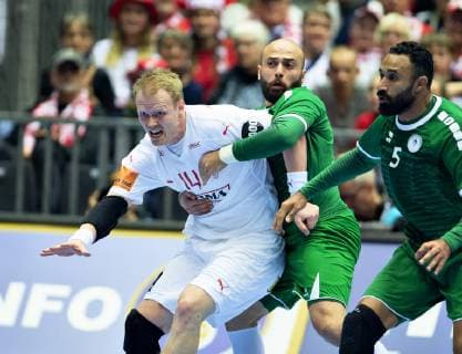 Anders Zachariassen of Denmark is held by Mahdi Alsalem of Saudi Arabia during the men s IHF Handball World Championship WM Weltmeisterschaft Group C match between Denmark and Saudi Arabia in Herning, Denmark, on Monday, Jan 14, 2019.. , Herning Jylland Denmark Copyright: HenningxBagger HenningxBaggerx COP101 spdk20190114-205834-L