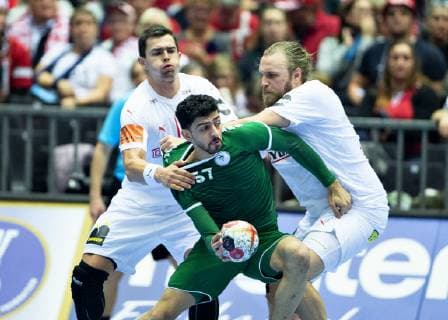 Mojtaba Alsalem of Saudi Arabia is being held by Henrik Moellgaard and Rasmus Lauge of Denmark during the men s IHF Handball World Championship WM Weltmeisterschaft Group C match between Denmark and Saudi Arabia in Herning, Denmark, on Monday, Jan 14, 2019.. , Herning Jylland Denmark Copyright: HenningxBagger HenningxBaggerx COP101 spdk20190114-221209-L