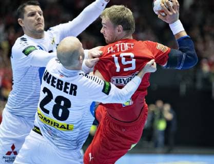 Rene Toft Hansen of Denmark against Robert Weber of Austria during the men s IHF Handball World Championship WM Weltmeisterschaft Group C match between Austria and Denmark in Herning, Denmark, on Tuesday, Jan 15, 2019.. , Herning Jylland Denmark Copyright: HenningxBagger HenningxBaggerx COP101 spdk20190115-205401-L