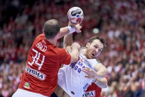 IHF Men s World Championship WM Weltmeisterschaft 2019 Group C handball match. Simon Hald (34) of Denmark and Christian O Sullivan (24) of Norway during the men s IHF Handball World Championship Group C match 57 between Denmark and Noway at the Jyske Bank Boxen arena in Herning Denmark on Thursday January 14, 2019. Denmark 