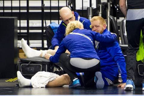 190117 Jim Gottfridsson of Sweden injured by the benches during the IHF World Handball Championship match between Sweden and Hungary on January 17, 2019 in Copenhagen. Photo: Ludvig Thunman BILDBYRN kod LT 35581 Copyright: LUDVIGxTHUNMAN BB190117LT063