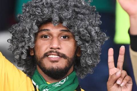 A Saudi Arabian football fan shows support for Saudi Arabia national football team in the 2019 AFC Asian Cup group E football match between Saudi Arabia and Qatar in Abu Dhabi, United Arab Emirates, 17 January 2019. Saudi Arabian football fans cheer for AFC Asian Cup group E match  20190117_53312