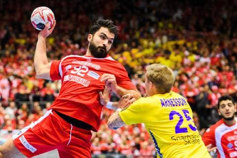 190119 Oussama Jaziri of Tunisia and Linus Arnesson of Sweden during the IHF World Handball Championship match between Tunisia and Sweden on January 19, 2019 in Herning. Photo: Petter Arvidson BILDBYRN kod PA 92204 Copyright: PETTERxARVIDSON BB190119PA050