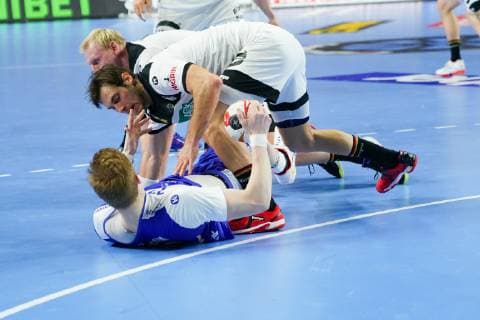 GER, IHF WM 2019, Deutschland (GER) vs Island (ISL) 19.01.2019, Lanxess Arena , Koeln, GER, IHF WM 2019, Deutschland (GER) vs Island (ISL) , im Bild picture shows: Ãmir Örn Oern Gislason (ISL 11), Paul Drux (GER 95), Patrick Wiencek (GER 7),