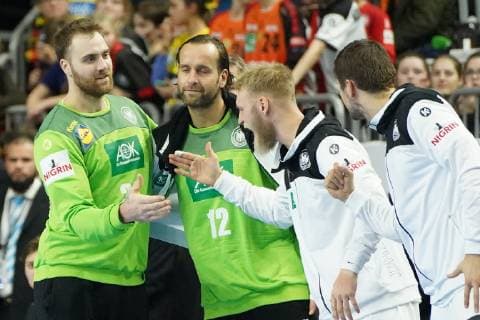 GER, IHF WM 2019, Deutschland (GER) vs Island (ISL) 19.01.2019, Lanxess Arena , Koeln, GER, IHF WM 2019, Deutschland (GER) vs Island (ISL) , im Bild picture shows: Silvio Heinevetter Torwart (GER 12), und Andreas Wolff Torwart (GER 33), freuen sich mit Matthias Musche (GER 37),