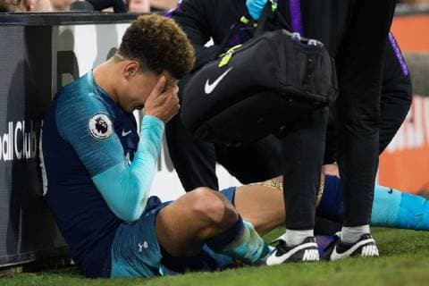 Dele Alli of Tottenham Hotspur looks dejected as he receives treatment for an injury during the Premier League match at Craven Cottage Stadium, London. Picture date: 20th January 2019. Picture credit should read: Craig Mercer Sportimage EDITORIAL USE ONLY. No use with unauthorised audio, video, data, fixture lists, club league logos or live services. Online in-match use limited to 120 images, no video emulation. No use in betting, games or single club league player publications. C77R8195.CR2