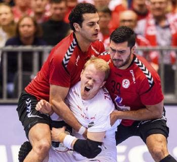 190121 Anders Zachariassen of Denmark in action with Mohamed Shebib and Yehia Elderaa of Egypt during the IHF World Handball Championship match between Egypt and Denmark on January 21, 2019 in Herning. Photo: Petter Arvidson BILDBYRN kod PA 92210 Copyright: PETTERxARVIDSON BB190121PA136