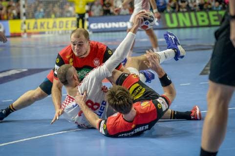 Sport Bilder des Tages Koeln, Deutschland, 21.01.2019, IHF Handball WM 2019, Hauptrunde, Kroatien - Deutschland, Uwe Gensheimer (GER), Zeljko Musa (CROATIA) im Zweikampf, Paul Drux (GER) ( DeFodi520