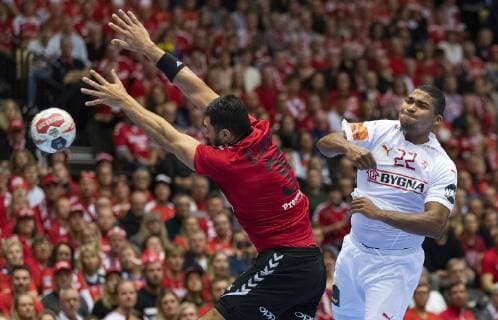 January 21, 2019 - Herning, Denmark - Yehia Elderaa, Egypt and Mads Mensah (22), Denmark in action during the group C handball match between Egypt and Denmark in Jyske Bank Boxen in Herning during the 2019 IHF Handball World Championship WM Weltmeisterschaft in Germany Denmark. Handball 2019: Egypt-Denmark - ZUMAm173 20190121_zsp_m173_003 Copyright: xLarsxMoellerx