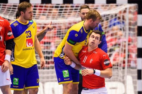 190123 Max Darj of Sweden helps Rasmus Lauge of Denmark during the IHF World Handball Championship match between Denmark and Sweden on January 23, 2019 in Herning. Photo: Petter Arvidson BILDBYRN kod PA 92213 Copyright: PETTERxARVIDSON BB190123PA054