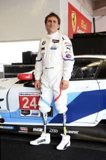Alessandro Zanardi (ITA) steht mit seinen Beinprothesesn bei einem Fotoshooting neben dem BMW M8 GTE 24, BMW Team RLL Garage, 24 Stunden Rennen International Speedway Daytona, Florida, USA, 23.01.2019 *** Alessandro Zanardi ITA stands with his leg prostheses at a photo shoot next to the BMW M8 GTE 24 BMW Team RLL Garage 24 Hours Race International Speedway Daytona Florida USA 23 01 2019