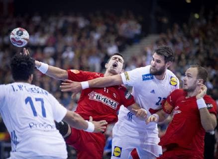 Rasmus Lauge and Henrik Toft Hansen of Denmark with Luka Karabatic of France during the men s IHF Handball World Championship WM Weltmeisterschaft semifinal between Denmark-France in Hamburg , Germany, on Friday, Jan. 25, 2019. , Hamburg Denmark Copyright: Scanpix LiselottexSabroex COP102 spdk20190125-182444-L