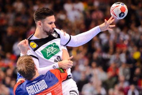 190125 Magnus Gullerud of Norway and Fabian Wiede of Germany during the IHF World Handball Championship match between Germany and Norway on January 25, 2019 in Hamburg. Photo: Ludvig Thunman BILDBYRN kod LT 35585 Copyright: LUDVIGxTHUNMAN BB190125LT068