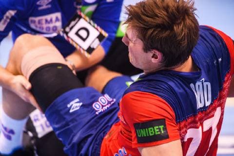 190125 Magnus Abelvik R¿d of Norway receives help after injury during the IHF World Handball Championship match between Germany and Norway on January 25, 2019 in Hamburg. Photo: Ludvig Thunman BILDBYRN kod LT 35585 Copyright: LUDVIGxTHUNMAN BB190125LT093