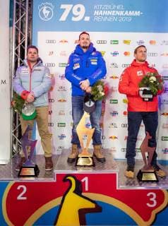 25.01.2019, Streif, Kitzbuehel, AUT, FIS Weltcup Ski Alpin, Abfahrt, Herren, Siegerehrung, im Bild v.l. Beat Feuz (SUI, 2. Platz), Dominik Paris (ITA, 1. Platz), Otmar Striedinger (AUT, 3. Platz) f.l. second placed Beat Feuz of Switzerland race winner Dominik Paris of Italy third placed Otmar Striedinger of Austria during the winner Ceremony for the men s Downhill of FIS Ski Alpine World Cup at the Streif in Kitzbuehel, Austria on 2019 01 25. Kitzbuehel