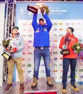 25.01.2019, Streif, Kitzbuehel, AUT, FIS Weltcup Ski Alpin, Abfahrt, Herren, Siegerehrung, im Bild v.l. Beat Feuz (SUI, 2. Platz), Dominik Paris (ITA, 1. Platz), Otmar Striedinger (AUT, 3. Platz) f.l. second placed Beat Feuz of Switzerland race winner Dominik Paris of Italy third placed Otmar Striedinger of Austria during the winner Ceremony for the men s Downhill of FIS Ski Alpine World Cup at the Streif in Kitzbuehel, Austria on 2019 01 25. Kitzbuehel