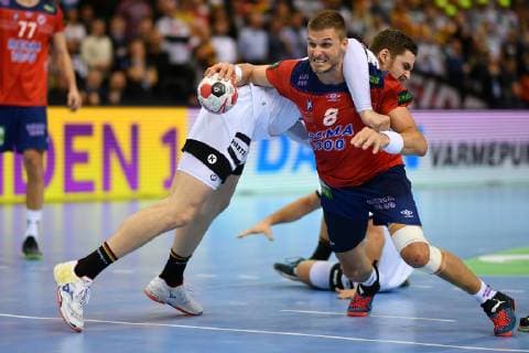(190126) -- HAMBURG, Jan. 26, 2019 -- Hendrik Pekeler of Germany (L) vies with Bjarte Myrhol of Norway during the IHF Men s Handball World Championship WM Weltmeisterschaft semifinals between Germany and Norway in Hamburg, Germany, on Jan. 25, 2019. Norway won 31-25. ) (SP)GERMANY-HAMBURG-MEN S HANDBALL-WORLD CHAMPIONSHIP-SEMIFINAL UlrichxHufnagel 