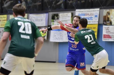 26.01.2019 - Handball - Saison 2018 2019 - Testspiel - Freundschaftsspiel : HC Erlangen HCE - Rimpar Wölfe - OGo - Lukas Siegler (20, DJK Rimpar Wölfe ) Nico Büdel (20, HC Erlangen ) Philipp Meyer (27, DJK Rimpar Wölfe )