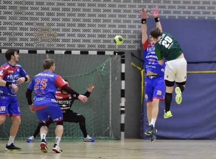 26.01.2019 - Handball - Saison 2018 2019 - Testspiel - Freundschaftsspiel : HC Erlangen HCE - Rimpar Wölfe - OGo - Andreas Schröder (71, HC Erlangen ) Lukas Siegler (20, DJK Rimpar Wölfe )