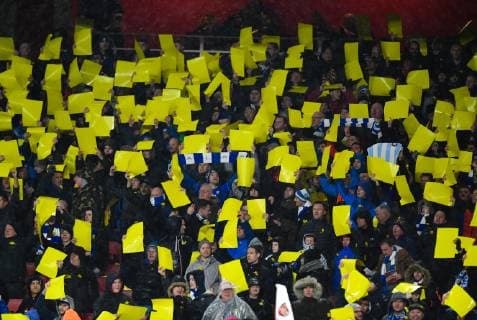 Football - 2018 2019 Premier League - Arsenal vs. Cardiff City Banners and yellow daffodil cards in support of Emiliano Sala the missing player, at The Emirates. COLORSPORT ASHLEY WESTERN 