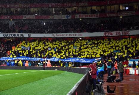 Football - 2018 2019 Premier League - Arsenal vs. Cardiff City Banners and yellow daffodil cards in support of Emiliano Sala the missing player, at The Emirates. COLORSPORT ASHLEY WESTERN 