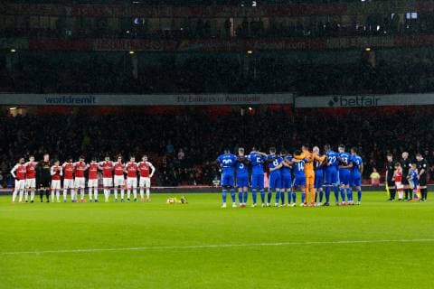 Players stand to remember Emiliano Sala of Cardiff City before the Premier League match at the Emirates Stadium, London. Picture date: 29th January 2019. Picture credit should read: Craig Mercer Sportimage EDITORIAL USE ONLY. No use with unauthorised audio, video, data, fixture lists, club league logos or live services. Online in-match use limited to 120 images, no video emulation. No use in betting, games or single club league player publications. EH9R8630.JPG