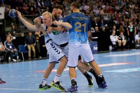 Stuttgart, Germany 01.02.2019, All Star Game 2019 - Handball, Fabian van Olphen (Allstar), Patrick Wiencek (GER) und Zeljko Musa (Allstar) im Zweikampf ( DeFodi541