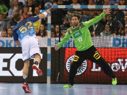 Stuttgart, Germany 01.02.2019, All Star Game 2019 - Handball, Marcel Schiller (Allstar) und Torwart Silvio Heinevetter (GER) im Zweikampf ( DeFodi541
